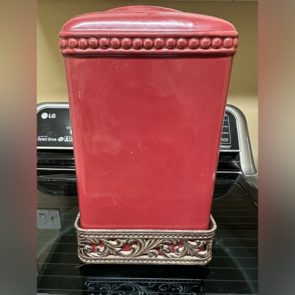 Large kitchen canister with antique gold accent base by gracious goods.